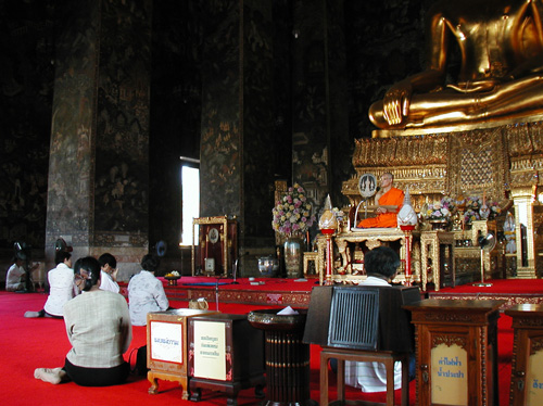  Monk gives lesson at Wat Suthat 