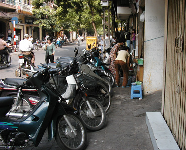 Sidewalk Becomes Parking Lot 