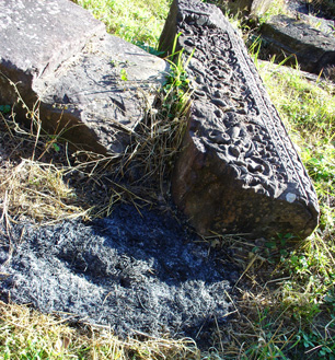 Carved slab as fire break