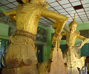 statue of rice bell being carried