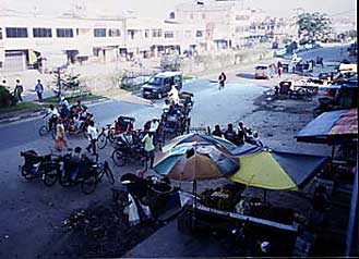 Dumai, Sumatra in front of fruit market.