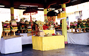 Fruit and Parasols around the Alter