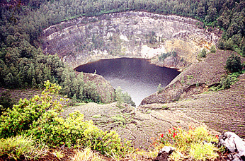 The brown colored lake on Kelimutu.