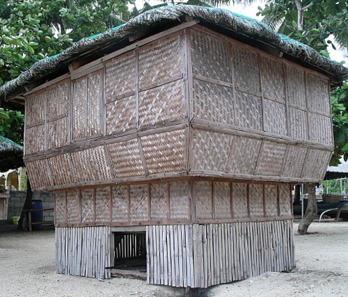  Nipa roof covered with netting.